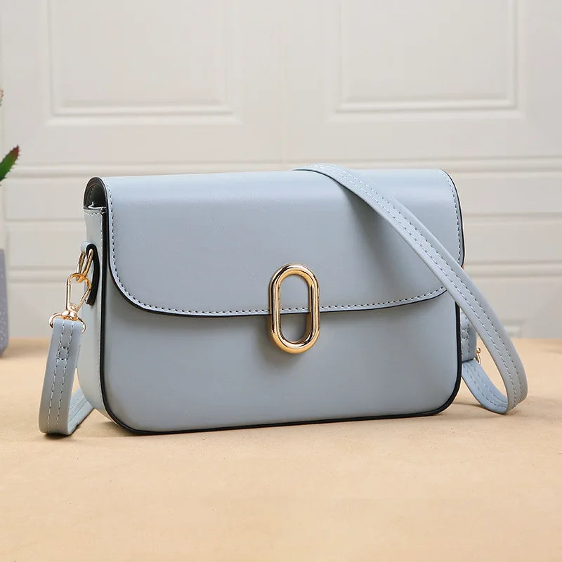 alina™ – elegant lysblå skuldertaske