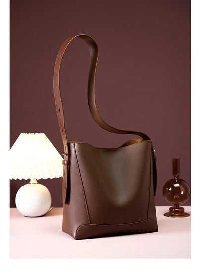 tine™ – elegant sandfarvet skuldertaske med bæltehank