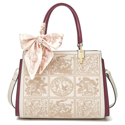 sylvia™ – unik crossbody med broderi og sløjfedetalje