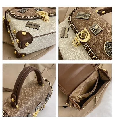 zelda™ – retro skuldertaske med monogram og gulddetaljer