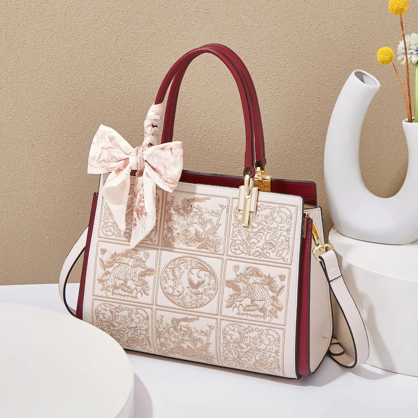 sylvia™ – unik crossbody med broderi og sløjfedetalje